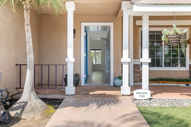 3232 Greenfield Ave, Clovis, CA 93611 - view of exterior entry featuring stucco siding and covered porch