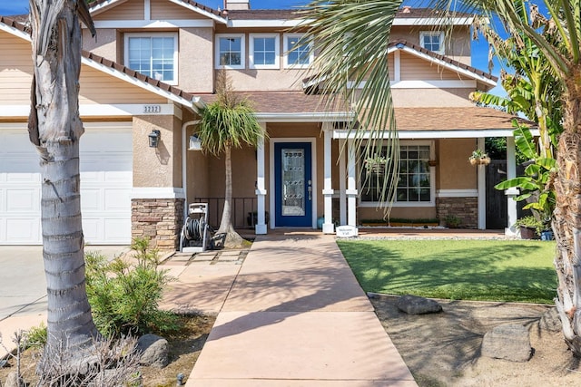 3232 Greenfield Ave, Clovis, CA 93611 - view of front of property with stone siding, stucco siding, covered porch, and a shingled roof