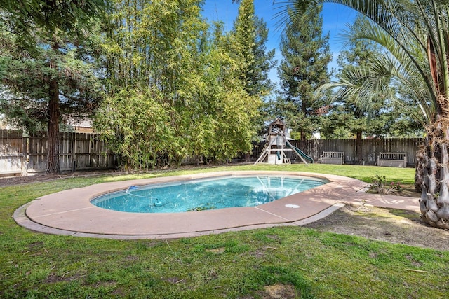 3232 Greenfield Ave, Clovis, CA 93611 - view of swimming pool featuring a playground and a fenced backyard