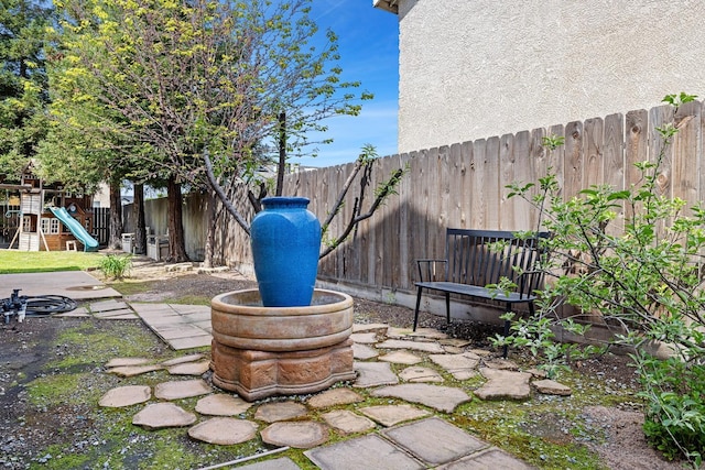 3232 Greenfield Ave, Clovis, CA 93611 - fenced backyard with a playground