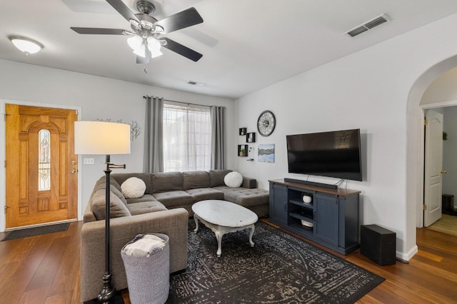 683 W Forest St, Kingsburg, CA 93631 - living area with arched walkways, a ceiling fan, visible vents, and wood finished floors