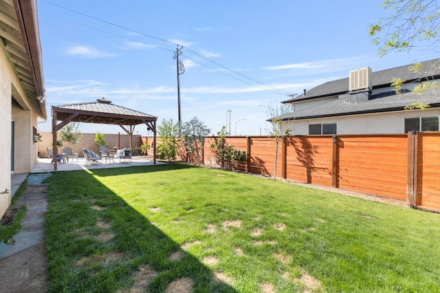 683 W Forest St, Kingsburg, CA 93631 - view of yard featuring a gazebo, a fenced backyard, central air condition unit, and a patio