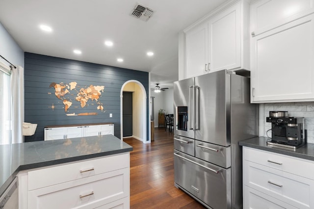 683 W Forest St, Kingsburg, CA 93631 - kitchen with dark wood-style flooring, high end fridge, dark countertops, recessed lighting, and visible vents