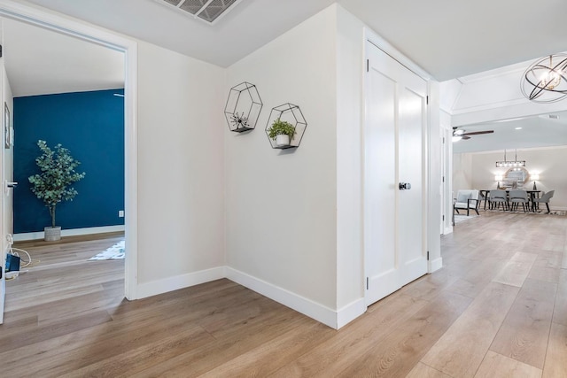 8683 N Colfax Ave, Fresno, CA 93720 - corridor with baseboards, visible vents, and light wood-style flooring