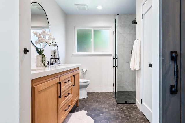 8683 N Colfax Ave, Fresno, CA 93720 - bathroom with vanity, toilet, baseboards, visible vents, and a stall shower