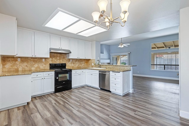 6187 W Alluvial Ave, Fresno, CA 93722 - kitchen with electric range, stainless steel dishwasher, under cabinet range hood, a peninsula, and light wood-type flooring