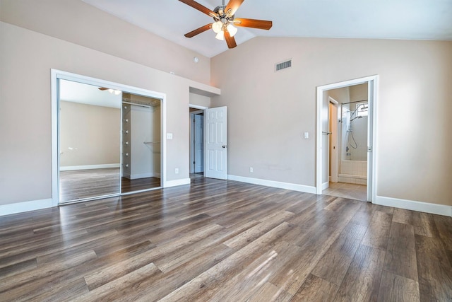 6187 W Alluvial Ave, Fresno, CA 93722 - unfurnished bedroom featuring wood finished floors, a closet, high vaulted ceiling, ensuite bath, and ceiling fan