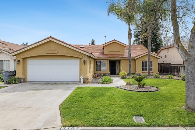 6187 W Alluvial Ave, Fresno, CA 93722 - ranch-style home with a tile roof, stucco siding, a garage, and concrete driveway