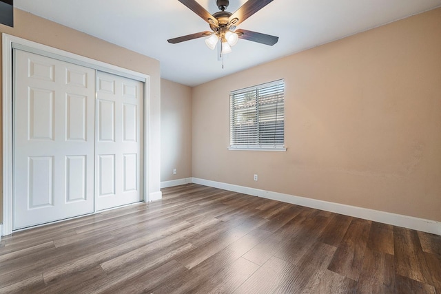 6187 W Alluvial Ave, Fresno, CA 93722 - unfurnished bedroom with wood finished floors, a closet, and a ceiling fan