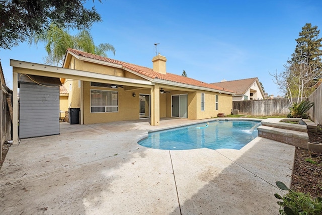 6187 W Alluvial Ave, Fresno, CA 93722 - view of swimming pool featuring a fenced backyard, ceiling fan, and a patio area