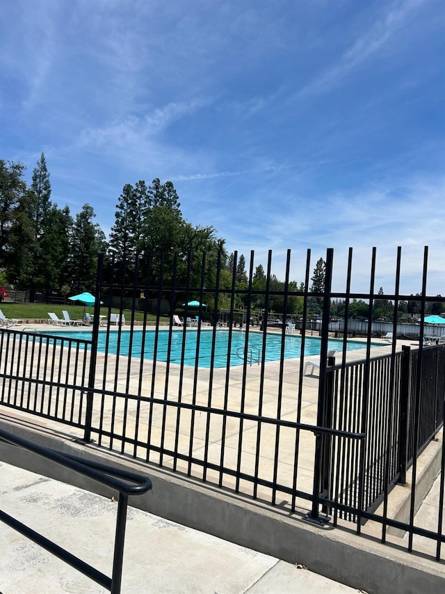 community pool with fence