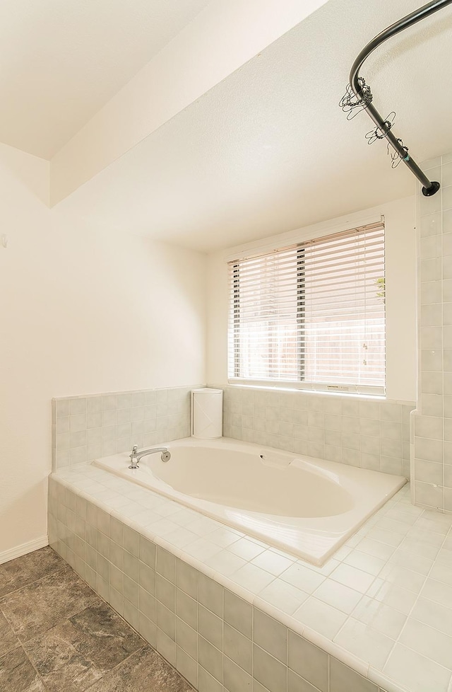 full bath featuring a garden tub