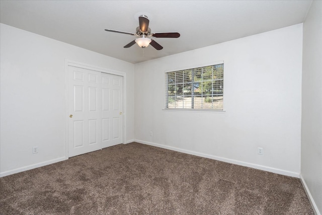 31200 Revis Rd, Coarsegold, CA 93614 - unfurnished bedroom with carpet floors, baseboards, a ceiling fan, and a closet