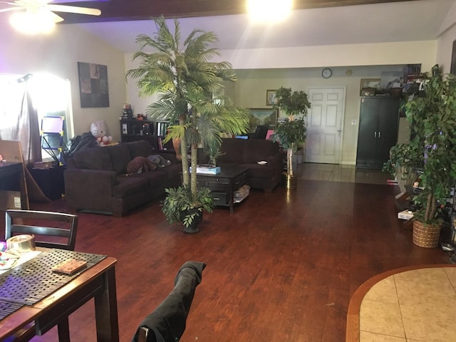 living area featuring ceiling fan and wood finished floors