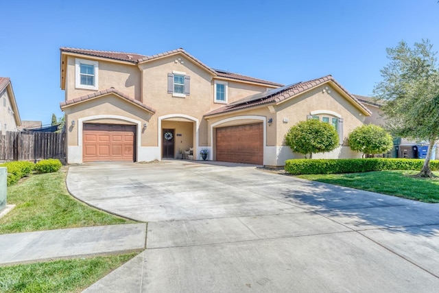 2960 3rd St, Sanger, CA 93657 - mediterranean / spanish-style home with a tiled roof, stucco siding, and roof mounted solar panels