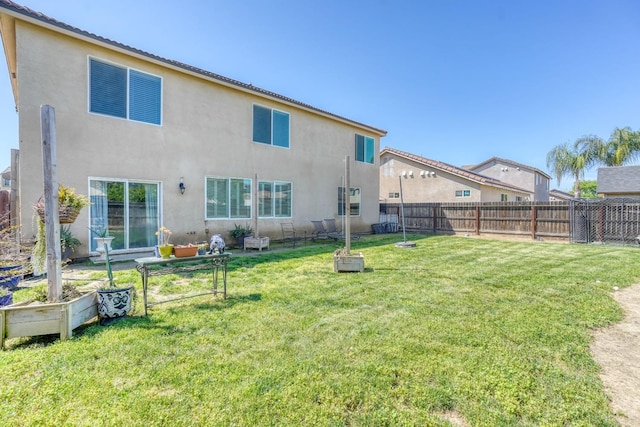2960 3rd St, Sanger, CA 93657 - rear view of house featuring stucco siding