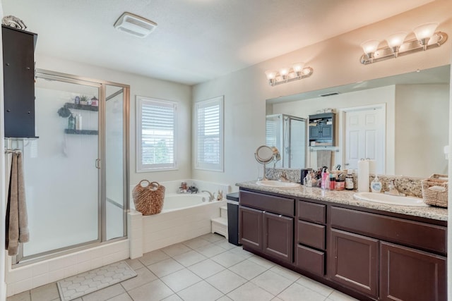 2960 3rd St, Sanger, CA 93657 - full bathroom with double vanity, a shower stall, a bath, and tile patterned floors