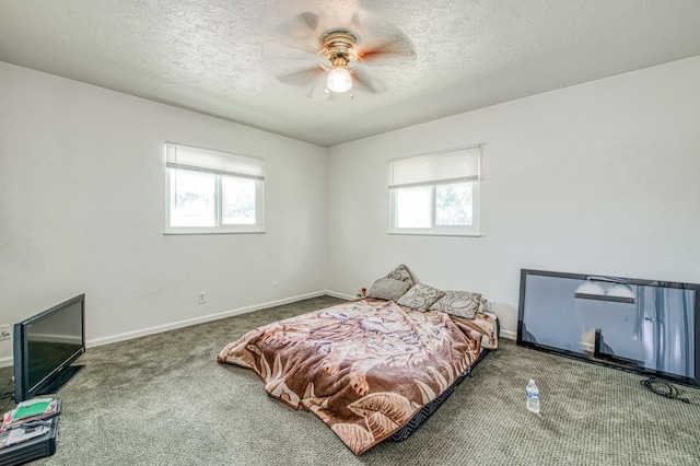 3907 E Dayton Ave, Fresno, CA 93726 - bedroom with carpet floors, a textured ceiling, baseboards, and a ceiling fan