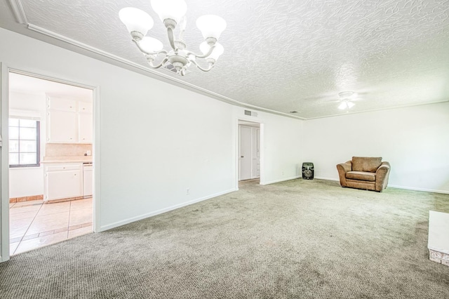 3907 E Dayton Ave, Fresno, CA 93726 - unfurnished room with a chandelier, a textured ceiling, light carpet, and baseboards