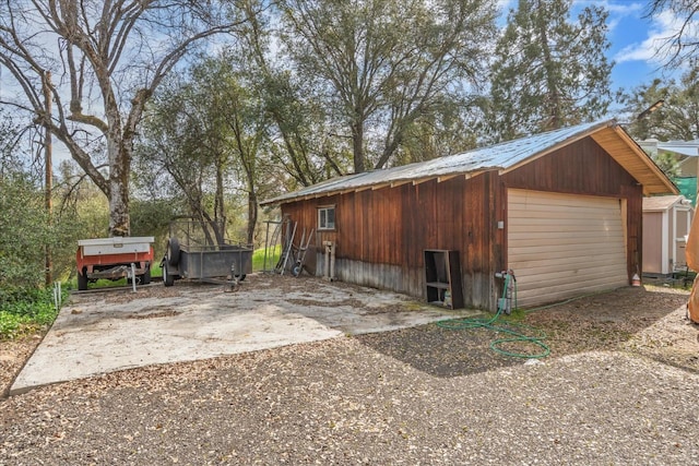detached garage with driveway