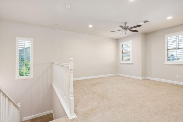 1905 E Via Fiore Ave, Fresno, CA 93730 - empty room featuring baseboards, light carpet, recessed lighting, a ceiling fan, and visible vents