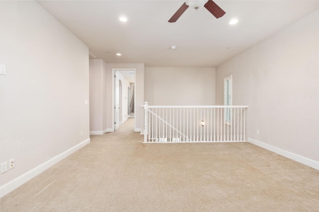 1905 E Via Fiore Ave, Fresno, CA 93730 - spare room with light colored carpet, ceiling fan, baseboards, and recessed lighting