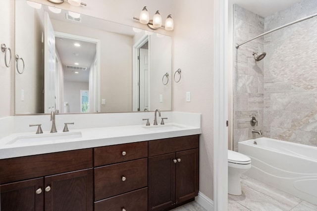1905 E Via Fiore Ave, Fresno, CA 93730 - full bath featuring toilet, a sink, and visible vents