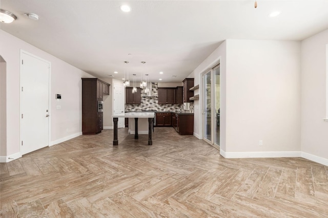 1905 E Via Fiore Ave, Fresno, CA 93730 - unfurnished living room featuring baseboards, recessed lighting, and arched walkways