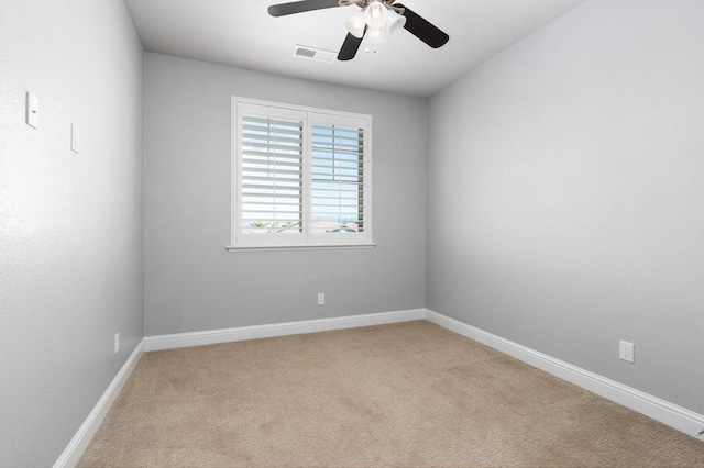 1905 E Via Fiore Ave, Fresno, CA 93730 - unfurnished room with visible vents, baseboards, a ceiling fan, and light carpet