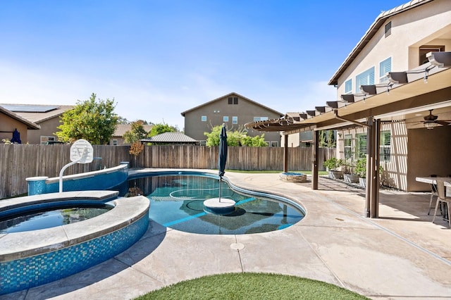 1905 E Via Fiore Ave, Fresno, CA 93730 - view of pool featuring a fenced backyard, a pool with connected hot tub, and a patio