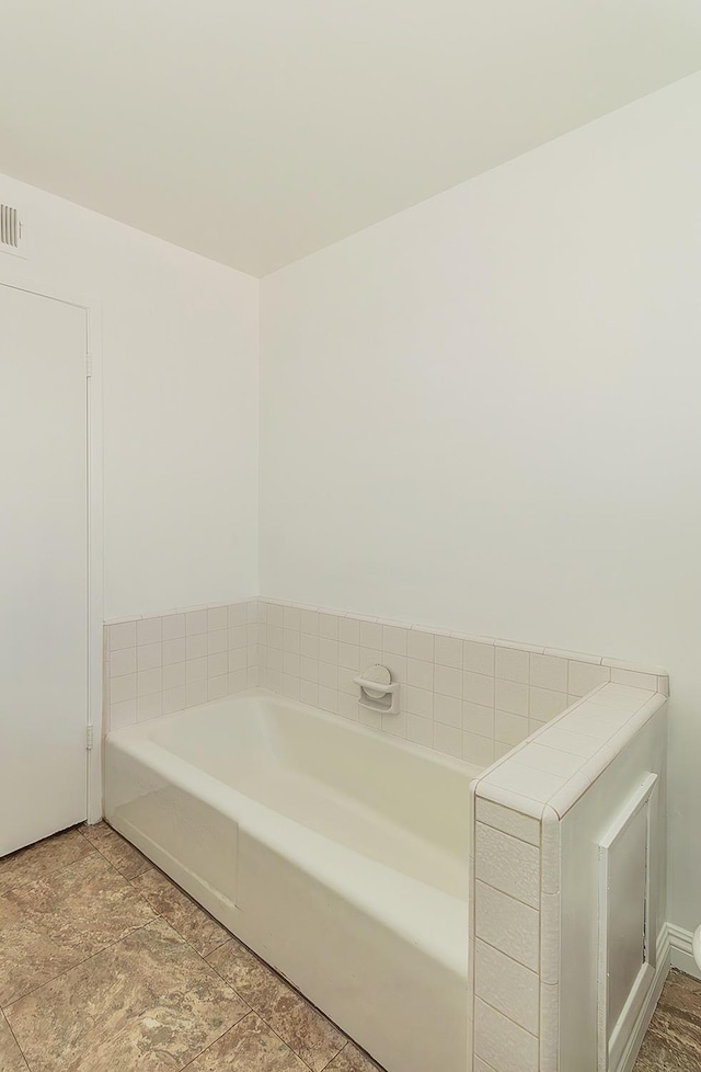 9798 S Thompson, Selma, CA 93662 - full bathroom with a garden tub and visible vents