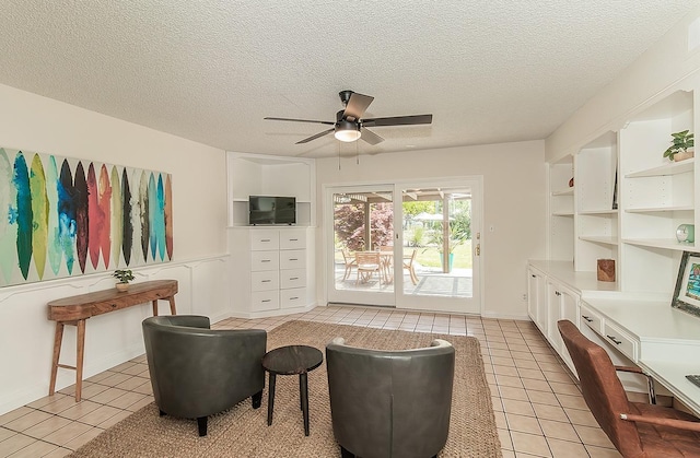 9798 S Thompson, Selma, CA 93662 - living area with light tile patterned floors, a ceiling fan, and a textured ceiling