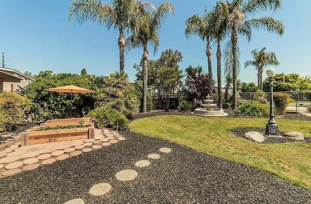 9798 S Thompson, Selma, CA 93662 - view of yard with a vegetable garden and fence
