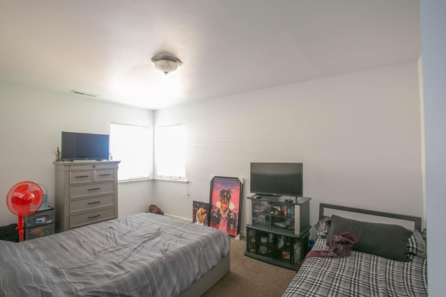 bedroom featuring carpet