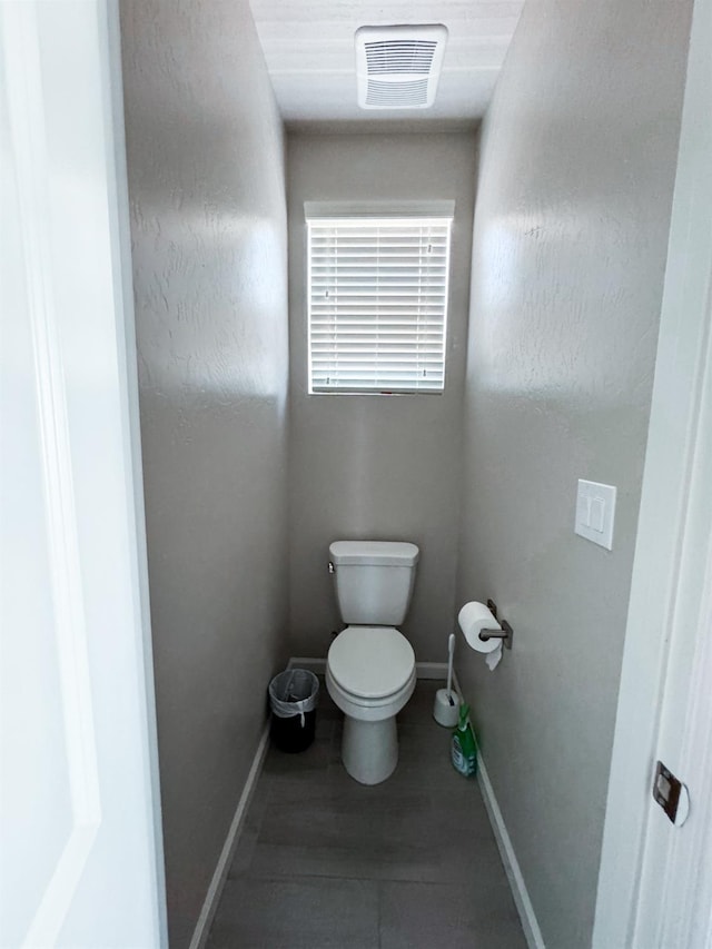 3395 Las Rosas Ave, Clovis, CA 93619 - bathroom featuring toilet and baseboards
