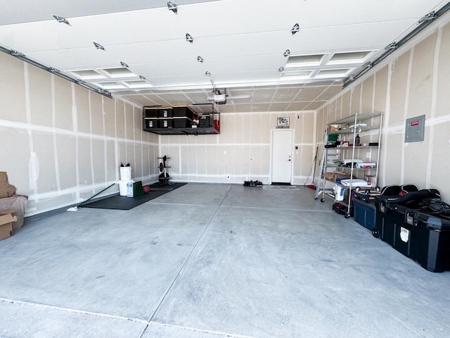 3395 Las Rosas Ave, Clovis, CA 93619 - garage with a garage door opener and electric panel