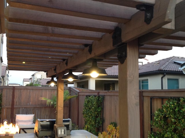 view of patio / terrace featuring fence