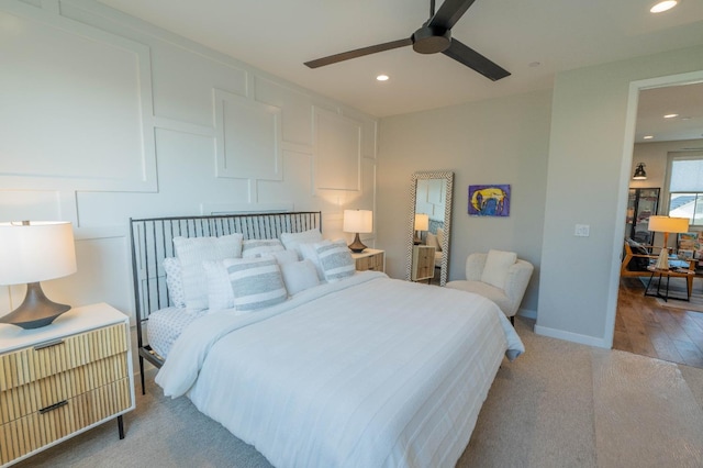 carpeted bedroom with baseboards, recessed lighting, and ceiling fan