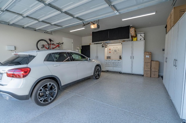 garage featuring a garage door opener