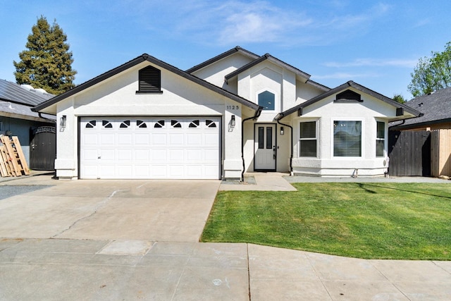 1125 N Purdue Ave, Clovis, CA 93611 - single story home featuring concrete driveway, a garage, and stucco siding