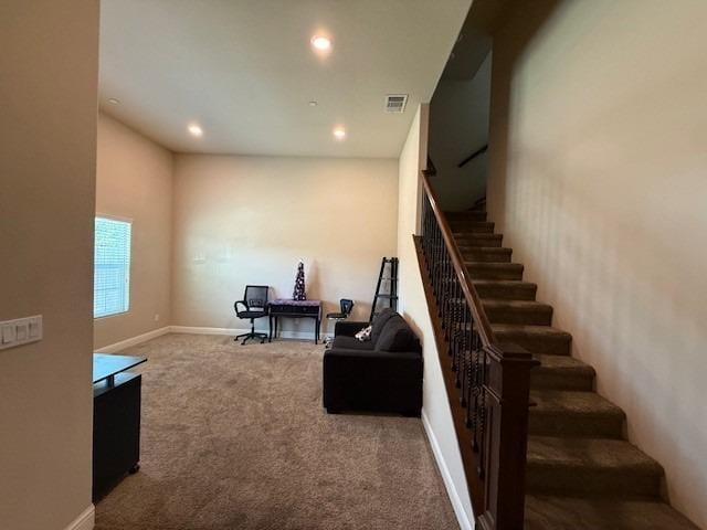 stairs with recessed lighting, baseboards, visible vents, and carpet floors