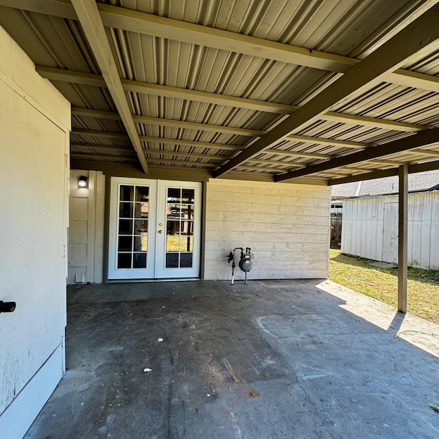 view of patio / terrace with french doors and fence