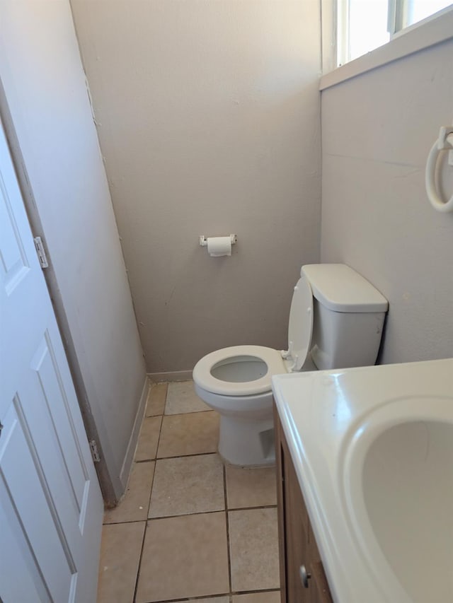 3525 Mayfair Dr N, Fresno, CA 93703 - bathroom with toilet, vanity, and tile patterned floors
