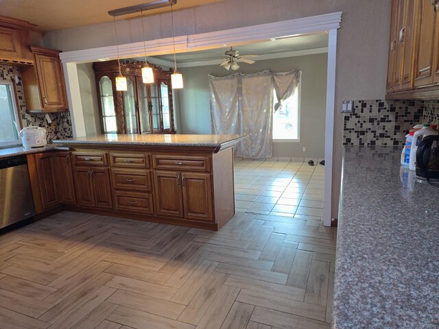 3525 Mayfair Dr N, Fresno, CA 93703 - kitchen featuring dishwasher, brown cabinetry, and decorative backsplash