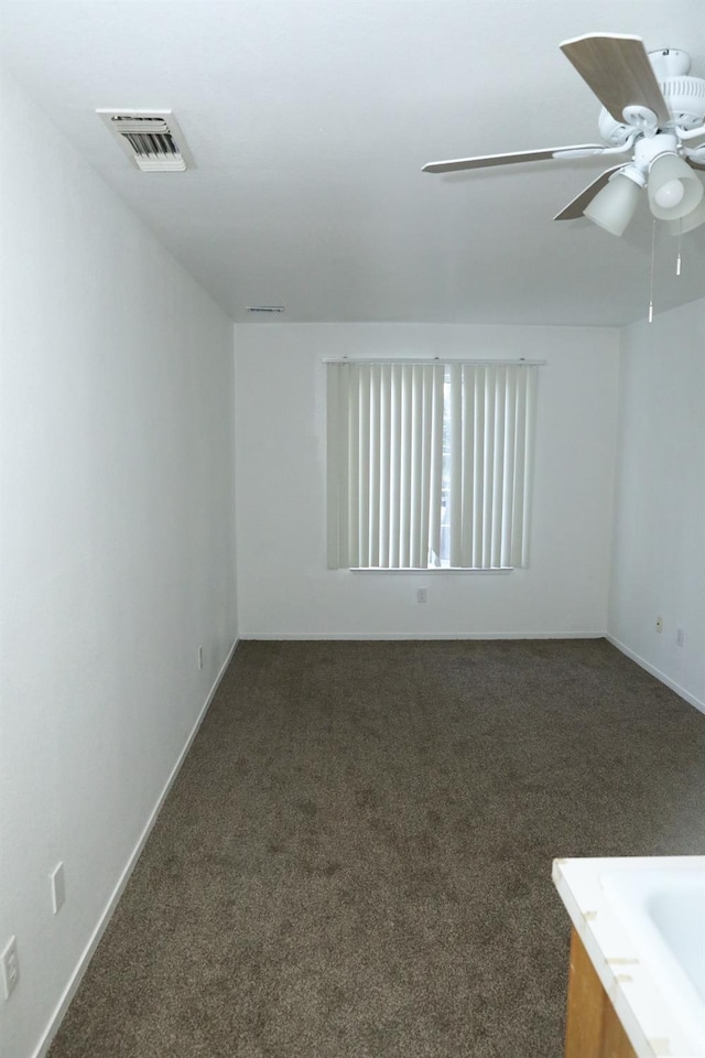 5157 E Truman Ave, Fresno, CA 93725 - unfurnished room featuring carpet floors, ceiling fan, and baseboards