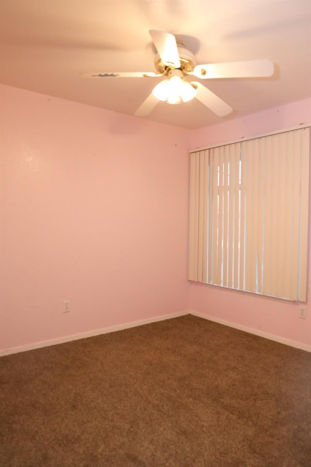 5157 E Truman Ave, Fresno, CA 93725 - carpeted empty room with a ceiling fan and baseboards