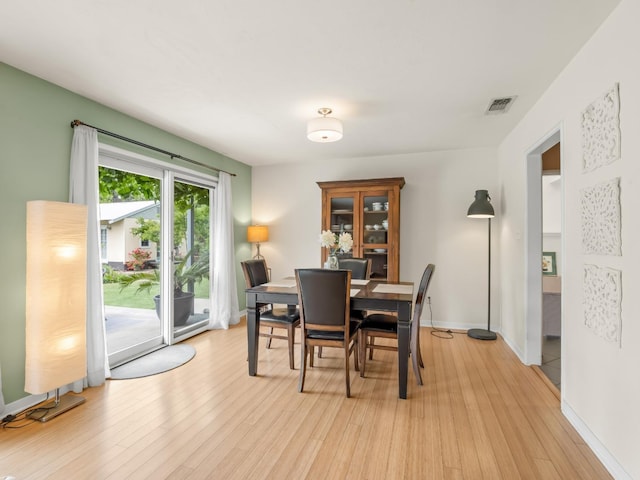 6043 N Forkner Ave, Fresno, CA 93711 - dining area featuring light wood-style flooring and baseboards