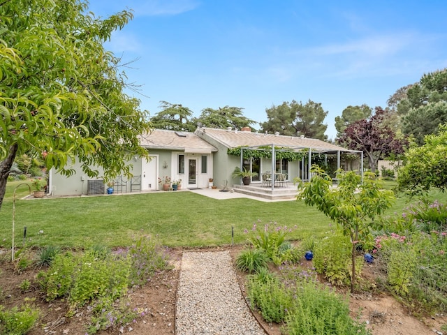 6043 N Forkner Ave, Fresno, CA 93711 - back of property featuring stucco siding, a yard, a patio area, and a pergola