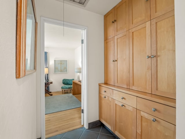 6043 N Forkner Ave, Fresno, CA 93711 - corridor featuring attic access and dark tile patterned flooring