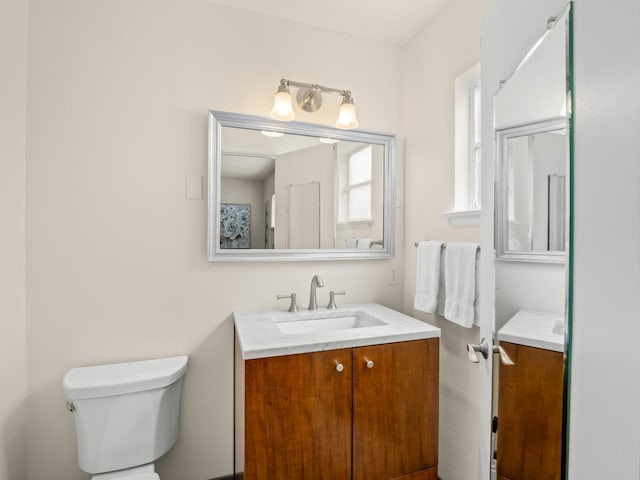6043 N Forkner Ave, Fresno, CA 93711 - bathroom featuring vanity and toilet